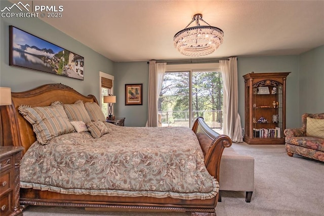 18383 Lazy Summer Way, Monument, CO 80132 - bedroom with carpet, a chandelier, and access to outside