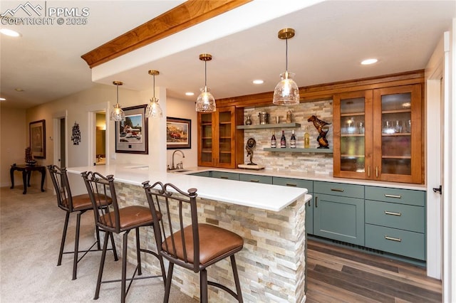 18383 Lazy Summer Way, Monument, CO 80132 - indoor wet bar with recessed lighting, hanging light fixtures, decorative backsplash, and dark wood-type flooring