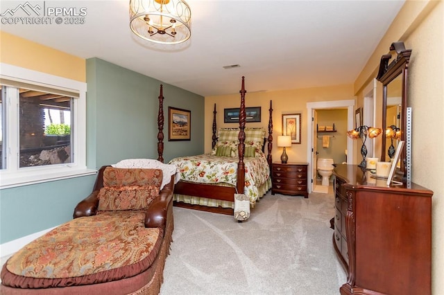 18383 Lazy Summer Way, Monument, CO 80132 - carpeted bedroom featuring ensuite bathroom and a chandelier