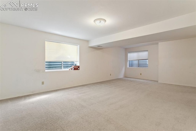 6627 Wagon Ridge Dr, Colorado Springs, CO 80923 - unfurnished room with light carpet and plenty of natural light