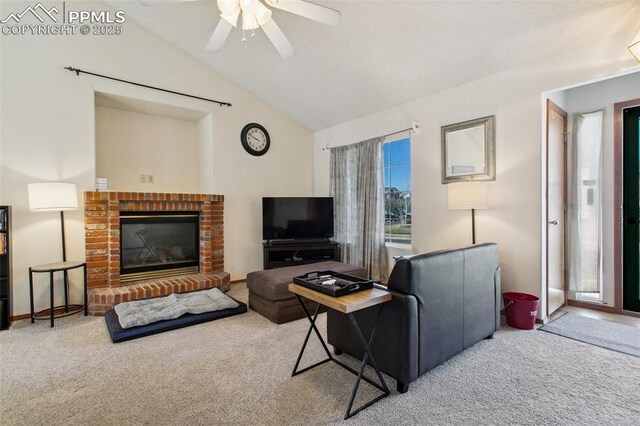 6627 Wagon Ridge Dr, Colorado Springs, CO 80923 - carpeted living room featuring a fireplace, ceiling fan, and lofted ceiling