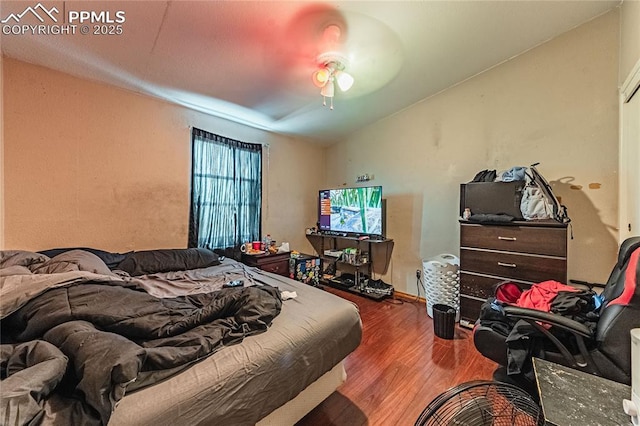 735 E Vermijo Ave, Colorado Springs, CO 80903 - bedroom featuring lofted ceiling, a ceiling fan, and wood finished floors