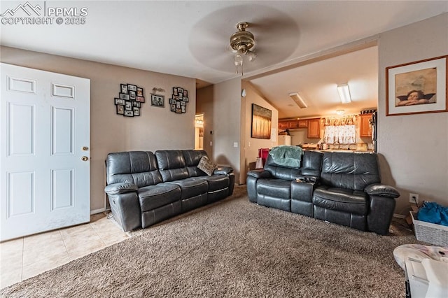 735 E Vermijo Ave, Colorado Springs, CO 80903 - living area featuring light tile patterned flooring, a ceiling fan, and light carpet