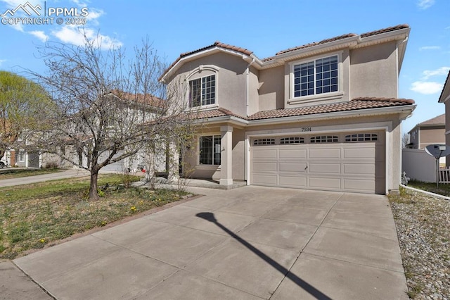 mediterranean / spanish house featuring a garage, a tiled roof, driveway, and stucco siding