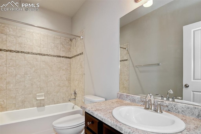 full bathroom featuring toilet, shower / bathing tub combination, and vanity