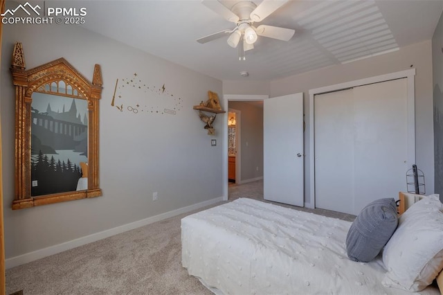 carpeted bedroom featuring baseboards, ceiling fan, and a closet