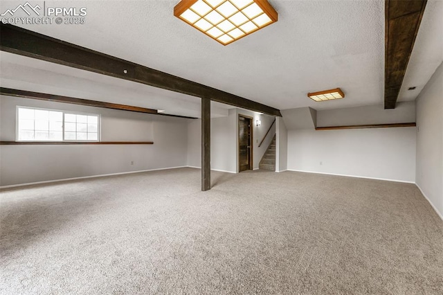 365 Waco Ct, Colorado Springs, CO 80919 - below grade area featuring stairs, a textured ceiling, baseboards, and carpet