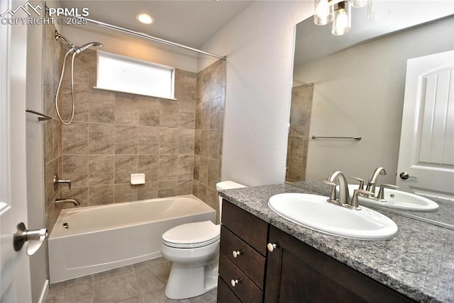 full bath featuring tile patterned floors, shower / bath combination, vanity, and toilet