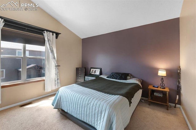 3828 Breaking Dawn St, Colorado Springs, CO 80925 - bedroom featuring visible vents, baseboards, vaulted ceiling, and carpet floors