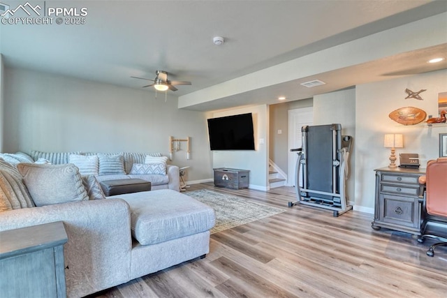 living room with visible vents, baseboards, a ceiling fan, recessed lighting, and light wood-style flooring