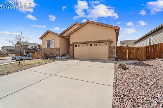 7814 Dry Willow Way, Colorado Springs, CO 80908 - ranch-style home featuring driveway, stucco siding, fence, and a garage
