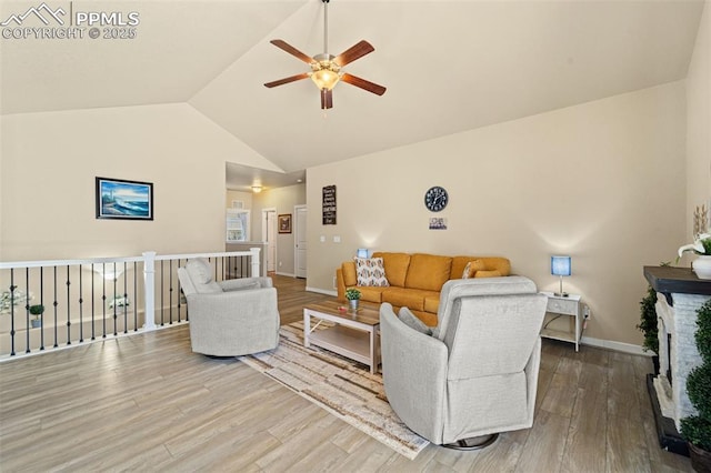 7814 Dry Willow Way, Colorado Springs, CO 80908 - living area with wood finished floors, baseboards, a ceiling fan, and vaulted ceiling