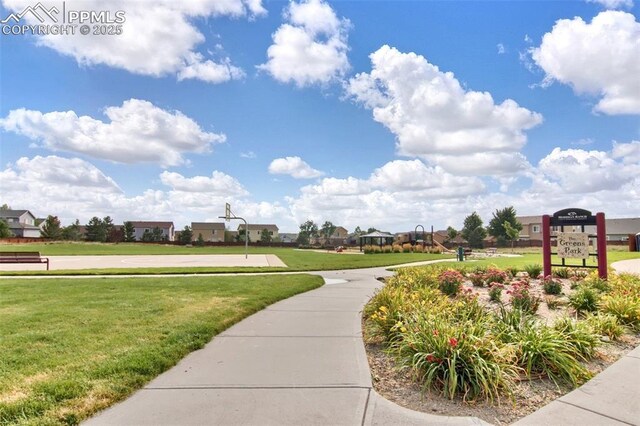 9843 Hidden Ranch Ct, Peyton, CO 80831 - surrounding community featuring a lawn
