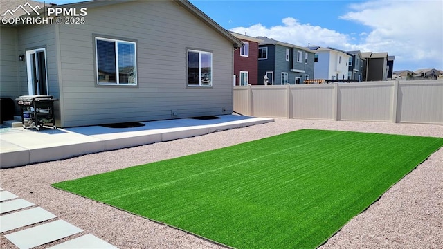 9843 Hidden Ranch Ct, Peyton, CO 80831 - view of yard with a residential view and a patio