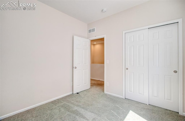 5033 Baseline Vw, Colorado Springs, CO 80920 - unfurnished bedroom featuring carpet floors, baseboards, and a closet