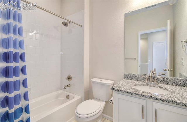 5033 Baseline Vw, Colorado Springs, CO 80920 - bathroom featuring shower / tub combo, vanity, and toilet
