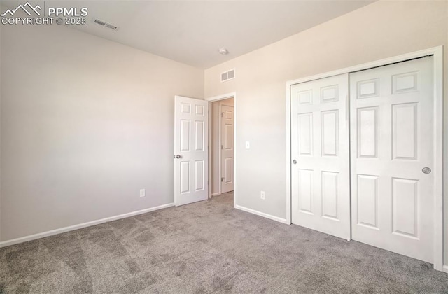 5033 Baseline Vw, Colorado Springs, CO 80920 - unfurnished bedroom with carpet, baseboards, and a closet