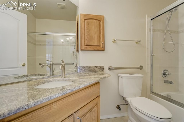 5584 Sonnet Hts, Colorado Springs, CO 80918 - full bathroom featuring visible vents, toilet, vanity, and enclosed tub / shower combo