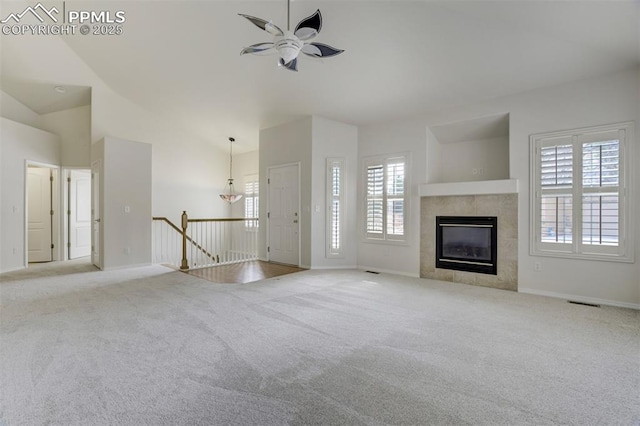 5584 Sonnet Hts, Colorado Springs, CO 80918 - unfurnished living room featuring a wealth of natural light, carpet flooring, and ceiling fan
