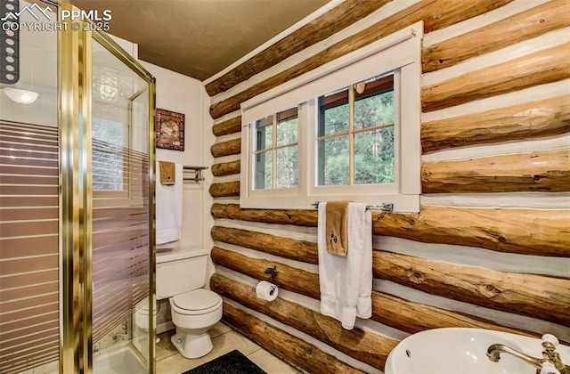 full bath featuring tile patterned flooring, log walls, a stall shower, and toilet