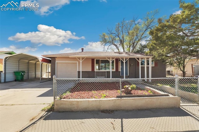 view of front of property with concrete driveway, fence, a porch, a garage, and a detached carport