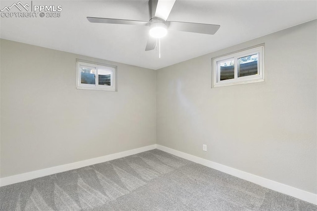 unfurnished room featuring carpet, baseboards, and ceiling fan