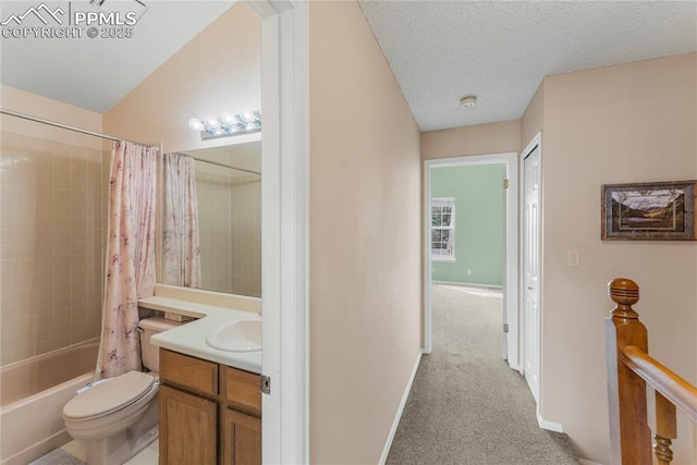 1951 Giltshire Dr, Colorado Springs, CO 80905 - full bathroom featuring a textured ceiling, shower / bathtub combination with curtain, vanity, toilet, and baseboards