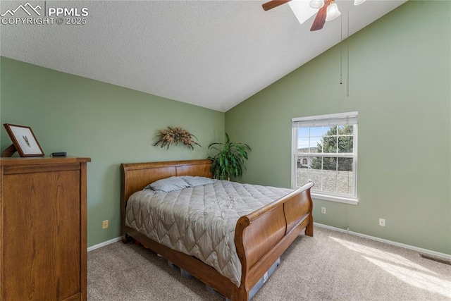 1951 Giltshire Dr, Colorado Springs, CO 80905 - carpeted bedroom featuring visible vents, baseboards, a ceiling fan, and lofted ceiling
