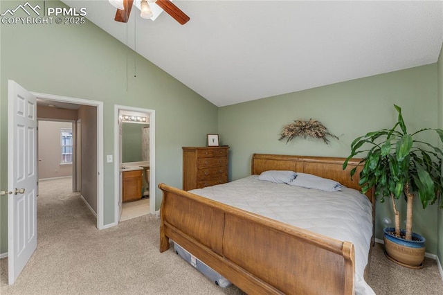 1951 Giltshire Dr, Colorado Springs, CO 80905 - bedroom featuring baseboards, light carpet, ensuite bath, ceiling fan, and high vaulted ceiling