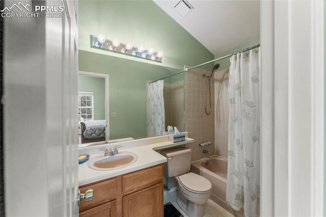 1951 Giltshire Dr, Colorado Springs, CO 80905 - ensuite bathroom with vanity, tile patterned flooring, visible vents, lofted ceiling, and shower / bath combo with shower curtain