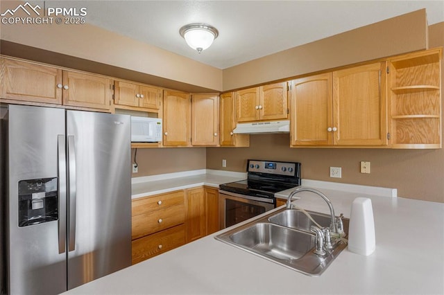 1951 Giltshire Dr, Colorado Springs, CO 80905 - kitchen with light countertops, open shelves, under cabinet range hood, appliances with stainless steel finishes, and a sink