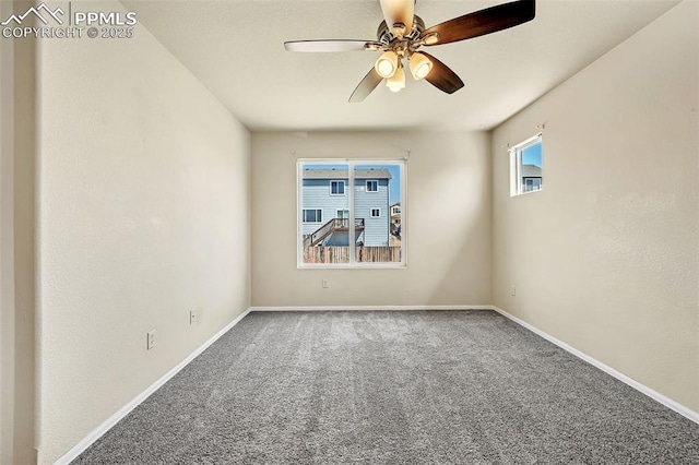 empty room with baseboards, carpet floors, and ceiling fan