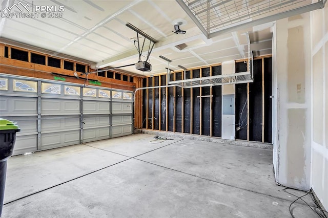 garage featuring a garage door opener