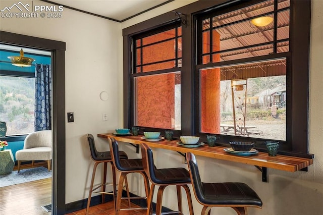 dining room featuring baseboards