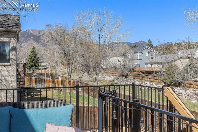 balcony featuring a mountain view