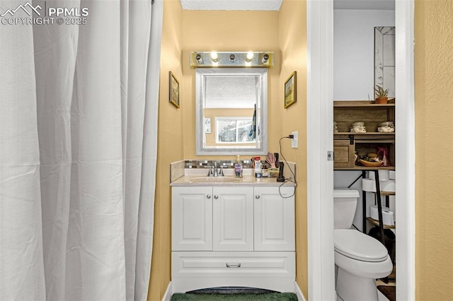 5030 El Camino Dr Unit 1, Colorado Springs, CO 80918 - full bathroom featuring vanity and toilet