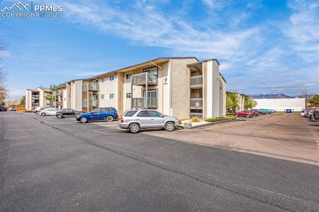 5030 El Camino Dr Unit 1, Colorado Springs, CO 80918 - view of property featuring uncovered parking