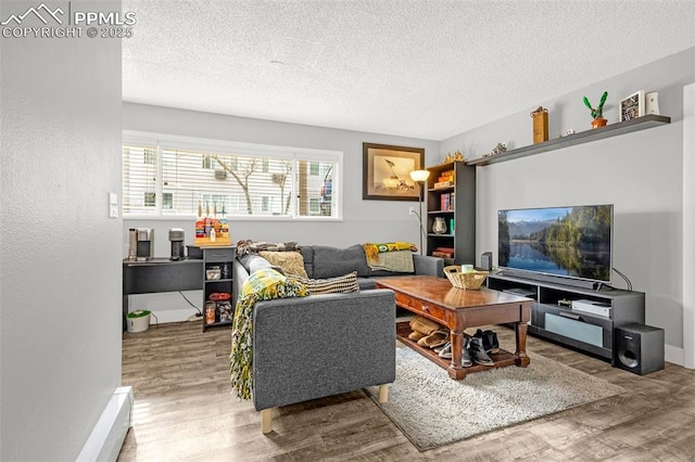 5030 El Camino Dr Unit 1, Colorado Springs, CO 80918 - living room with a textured ceiling and wood finished floors