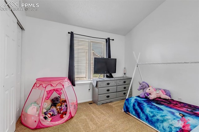 4626 Hotspur Dr, Colorado Springs, CO 80922 - carpeted bedroom featuring lofted ceiling, baseboards, and a closet