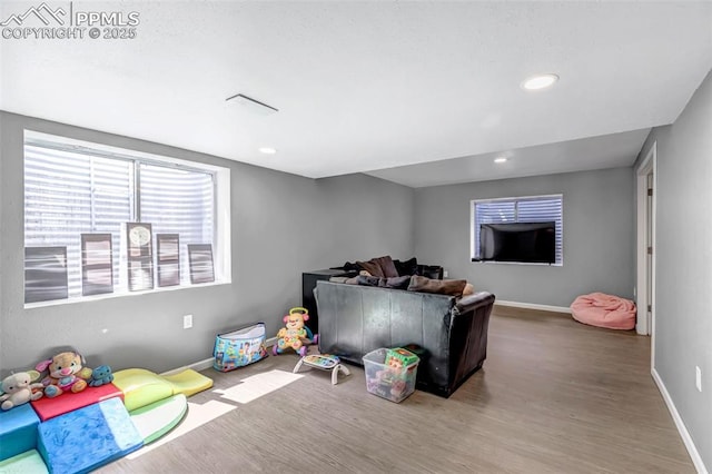 4626 Hotspur Dr, Colorado Springs, CO 80922 - rec room featuring baseboards and wood finished floors