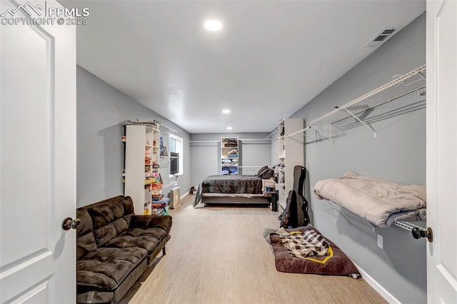 4626 Hotspur Dr, Colorado Springs, CO 80922 - bedroom with wood finished floors, visible vents, and recessed lighting