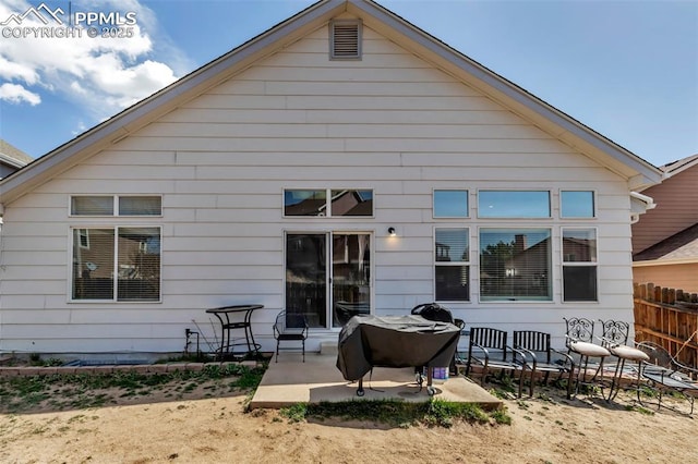 4626 Hotspur Dr, Colorado Springs, CO 80922 - rear view of house featuring fence and a patio