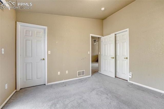 5542 Sunshade Pt, Colorado Springs, CO 80923 - unfurnished bedroom featuring visible vents, baseboards, and carpet