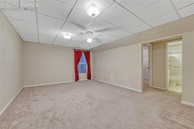 5542 Sunshade Pt, Colorado Springs, CO 80923 - carpeted empty room with baseboards and a drop ceiling