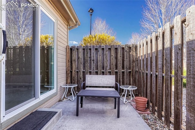 5542 Sunshade Pt, Colorado Springs, CO 80923 - view of patio featuring a fenced backyard