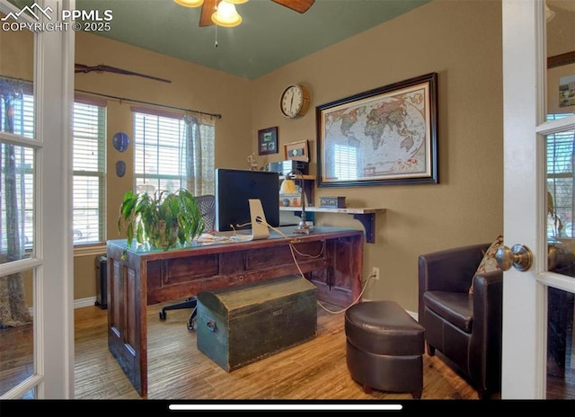 8723 Stony Creek Dr, Colorado Springs, CO 80924 - home office featuring wood finished floors and a ceiling fan