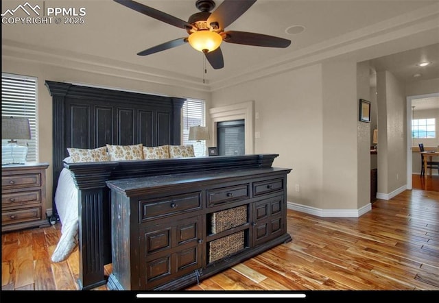 8723 Stony Creek Dr, Colorado Springs, CO 80924 - bedroom featuring light wood-type flooring and baseboards