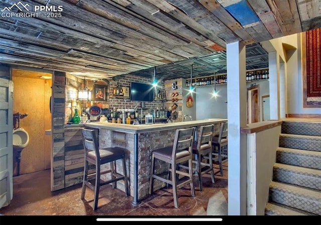 8723 Stony Creek Dr, Colorado Springs, CO 80924 - indoor wet bar with wooden ceiling
