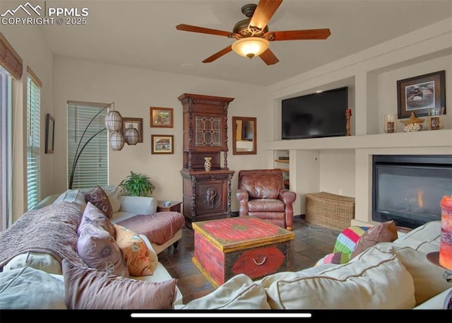 8723 Stony Creek Dr, Colorado Springs, CO 80924 - living room with a fireplace and a ceiling fan