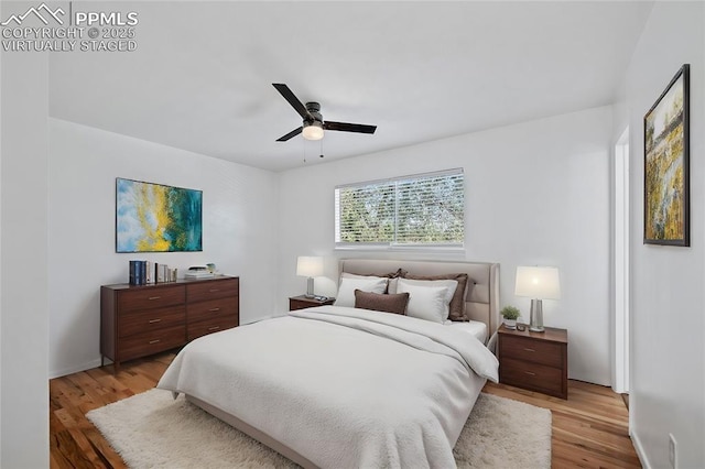 1540 Shasta Dr, Colorado Springs, CO 80910 - bedroom with light wood-type flooring, ceiling fan, and baseboards